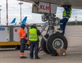 Moscow, Russia - June 6. 2018. Technicians conduct pre-flight preparation of aircraft in Vnukovo airport