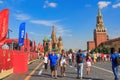 Moscow, Russia - June 28, 2018: Tourists walking near Football Park on Red square on a background of St. Basil`s Cathedral and Mos Royalty Free Stock Photo