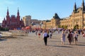 Moscow, Russia - June 28, 2018: Tourists walking on Red square on a background of State Historical Museum and GUM Department store Royalty Free Stock Photo