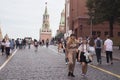 Two fashionably dressed girl friends are walking along the Red Square Royalty Free Stock Photo