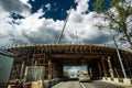 Moscow, Russia - June 5, 2015. under construction overpass over Leningrad Highway against stormy sky