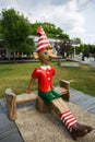 Wooden sculpture of Buratino (Russian Pinocchio) in the park Royalty Free Stock Photo