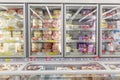 Moscow, Russia, 07/17/2020: Large assortment of ice cream on refrigerator shelves in a supermarket. Front view