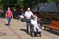 Moscow, Russia, August, 12, 2018. Man with disabilities in a wheelchair on Chistoprudny Boulevard in Moscow