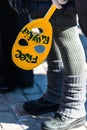 Activist holds the mask, the symbol of Riot on picket to f