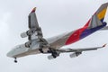 Moscow, Russia - March 17, 2019: Aircraft Boeing 747-48EBDSF HL7413 of Asiana Airlines going to landing at Domodedovo Royalty Free Stock Photo