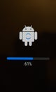 Moscow, Russia - March 23 2021: Android update download screen with logo and download percentage