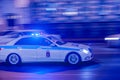 MOSCOW, RUSSIA - MARCH 12, 2018: The blurry silhouette of the speeding police car DPS traffic police with flashing lights