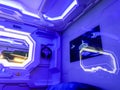 Moscow, Russia, March 2019: Interior of futuristic Capsule hotel. Inside the capsule: sleeping place mirror, control panel and