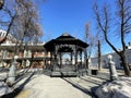 Moscow, Russia, March, 21, 2022. Large, wrought-iron gazebo in the Hermitage Garden on a clear spring day. Russia, Moscow