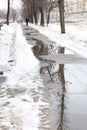 Moscow. Russia. March 3, 2121. Leninsky Prospekt. melting snow. puddle on the road. spring in the city