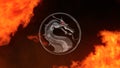 Moscow, Russia - March 20 2021: Mortal Kombat. Dragon logo made of old metal, red glowing eye in a round ring in blazing fire on a