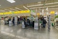 MOSCOW, RUSSIA -MARCH 14: People pay for goods at checkout in Leroy Merlin