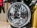 Moscow, Russia - March 17, 2018: A shallow focus shot of the front headlight of a vintage BMW motorcycle. Royalty Free Stock Photo