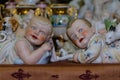 Moscow, Russia - March 19, 2017: Vintage collection porcelain figurines of ruddy boys and girls of the Victorian era