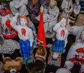 Moscow, Russia - March 19, 2017: Vintage porcelain figurines of scouts, boy and girl saluting at a red flag of pioneers