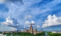 Sunny campus buildings of famous Moscow university under dramatic cloudy sky in spring Royalty Free Stock Photo