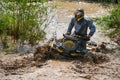 Athletes on ATV in a deep puddle, MUD RACING