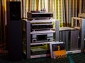 Audio systems Burmester - turntable, floorstanding speakers, preamp, power amp in a dark room at the hi fi high end show Royalty Free Stock Photo