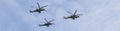 Banner with the flight of three Mi-24 military helicopters in the sky. The main rehearsal of military