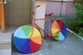 Bicycle with wheels tied on the street of Moscow