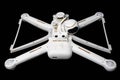 Moscow, Russia - May 13, 2019: Broken white Xiaomi Mi drone 4k after a fall. On a black background. Damaged body, motor and