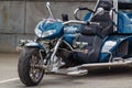 Moscow, Russia - May 04, 2019: Chromed BOOM tourist trike in a parking at sunny day. Moto festival MosMotoFest 2019