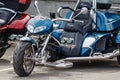 Moscow, Russia - May 04, 2019: Chromed BOOM tourist trike in a parking at sunny day. Moto festival MosMotoFest 2019