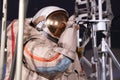 Moscow, Russia - May 04,2022 : A cosmonaut in a spacesuit from the times of the Soviet Union at work