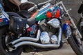 Moscow, Russia - May 04, 2019: Custom chromed and painted with airbrushing tourist motorcycle Honda in the parking closeup. Moto