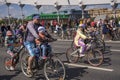 Moscow. Russia. 19 may 2019. Moscow Cycling festival 2019. The father goes with his daughters on a speculative Bicycle