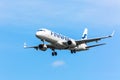 Moscow, Russia - May, 2018: Embraer ERJ-190LR OH-LKL of Finnair landing at Sheremetyevo international airport in Moscow against bl Royalty Free Stock Photo