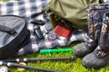 Things hunter on the grass. A necessary set of items for natural extreme travel.