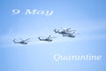 Fighters, flying helicopters at The Victory Day military parade. Text 9 May quarantine Royalty Free Stock Photo