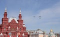 The flight in the sky of three IL-76MD heavy long-range military aircrafts in a blue sky. The main