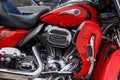 Moscow, Russia - May 04, 2019: Fragment of chrome engine with exhaust system pipes of Harley Davidson motorcycle. Moto festival