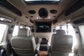 Moscow, Russia - May 2, 2019: GMC Savana/ Chevrolet Express tuning interior. Custom tuned interior with telephone, sound system