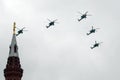 The Golden Eagles aerobatic team on Mi-28N attack helicopters in the sky over Moscow`s Red Square during the Victory Air Parade Royalty Free Stock Photo