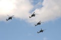 The Golden Eagles aerobatic team on Mi-28N attack helicopters in the sky over Moscow`s Red Square during the dress rehearsal of th