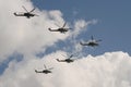 The Golden Eagles aerobatic team on Mi-28N attack helicopters in the sky over Moscow`s Red Square during the dress rehearsal of th