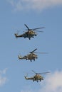 A group of Mi-35M and Mi-24 attack combat helicopters in the sky over Moscow`s Red Square during the dress rehearsal of the Victor Royalty Free Stock Photo