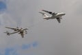 The IL-78 tanker aircraft simulates refueling in the air of the Tu-95MS `Bear` strategic bomber in the sky over Moscow during the Royalty Free Stock Photo