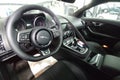 Moscow, Russia - May 1, 2019: Interior of Black Jaguar F-Type R on a lift at a Land Rover service center. Repair and diagnostics