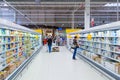 The interior of a supermarket with consumers Royalty Free Stock Photo