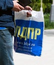 Moscow, Russia - May 31. 2021. LDPR - Liberal Democratic Party of Russia - Members hand out packages of campaign