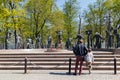 Moscow, Russia - May 01, 2019: Man and child near sculpture Children - victims of adult vices on Bolotnaya square in Moscow at Royalty Free Stock Photo