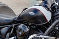 Moscow, Russia - May 04, 2019: Matte black and white fuel tank with emblem of Kawasaki Vulcan tourist motorcycle closeup. Moto