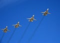 Upgraded front-line bomber with variable sweep wing su-24M during the parade, flying in the sky over red square.