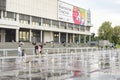 Moscow, Russia - May 28, 2021: Moscow Design Museum New Tretyakov Gallery, wooden terrace and city fountain, Moscow residents rest