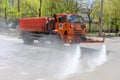 MOSCOW, RUSSIA - MAY 08,2015: Multipurpose road machine KamAZ which can operate as dump truck or as street cleaner for washing Royalty Free Stock Photo